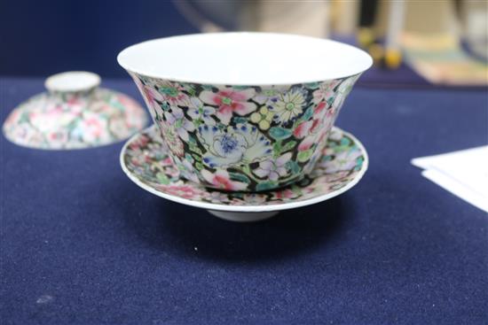 A Chinese ruby ground famille rose dish, early 20th century and a rice bowl, cover and stand